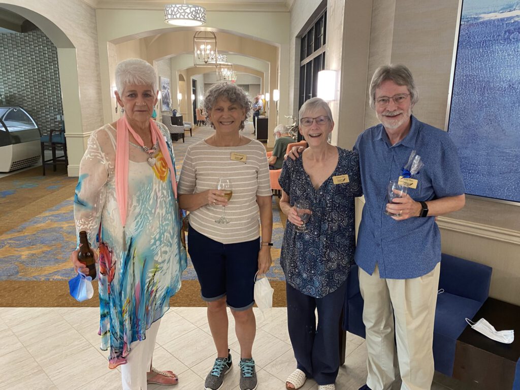 Legacy Pointe residents posing for photo in the lobby